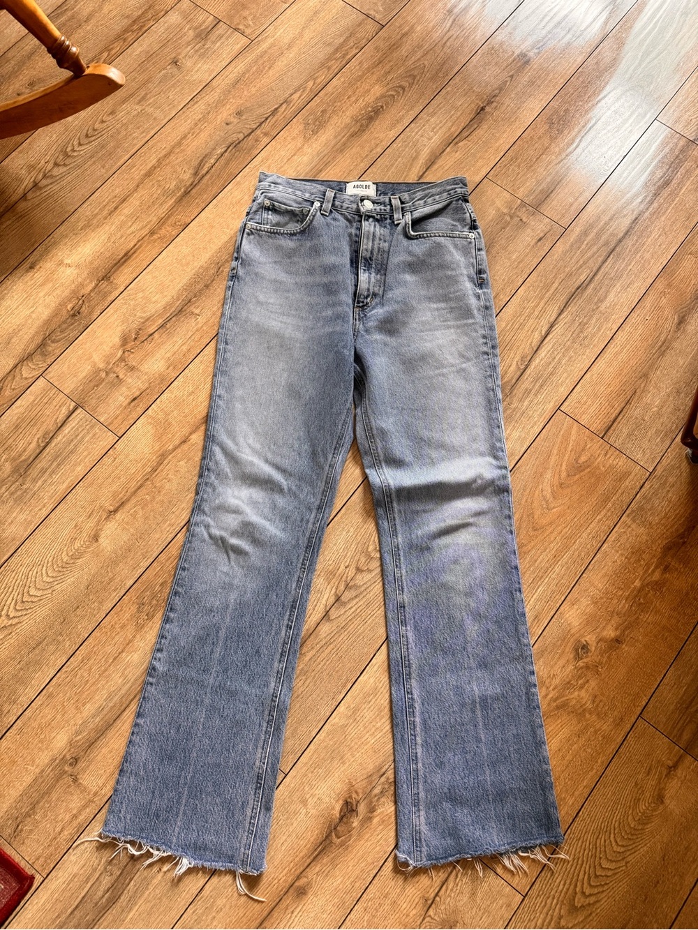 Agolde Light Blue Flared Jeans with Frayed Hem
